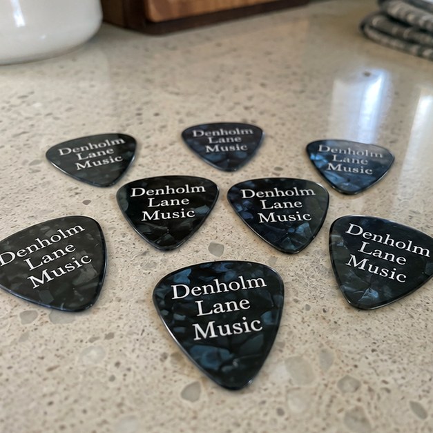 Custom guitar picks — customer photo